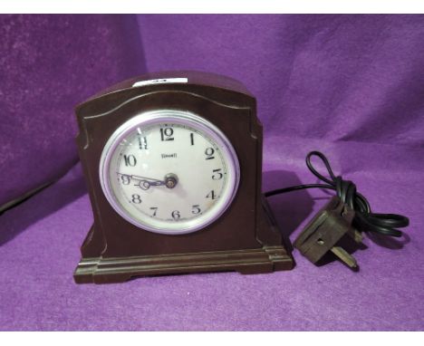 A vintage bakelite mantle clock by Ferranti