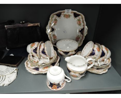 A vintage part tea service by Tuscan China
