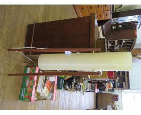 A 1960s teak tripod standard lamp with long cylindrical shade 112cm high