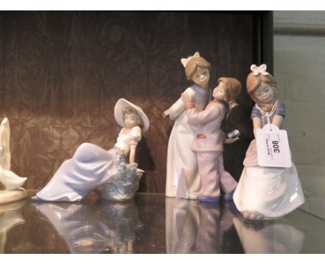 Two Lladro figures, Bashful Bather 12cm high and a goose model, and six other Nao figures including two girls with presents 2