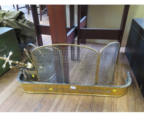 A brass coal scuttle, fire fender, screen and fire tools