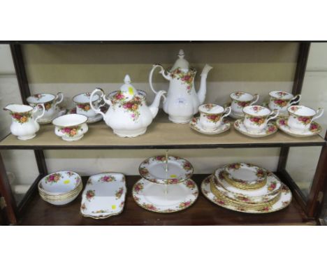 A Royal Albert Old Counrty Roses pattern part tea, coffee and dinner service, including teapot, coffee pot, and serving plate