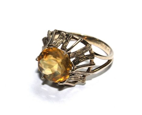 A 9 carat gold dress ring with citrine