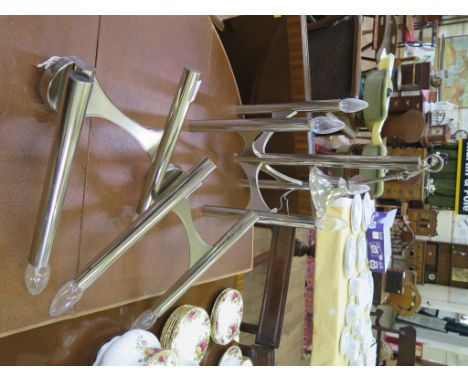 A 1970s chrome eight light chandelier 57cm diameter, a matching four-light chandelier and two pairs of wall lights (4)