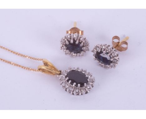 A set comprising of a pair of 9ct yellow &amp; white gold oval cut sapphire &amp; diamond stud earrings with post &amp; butte