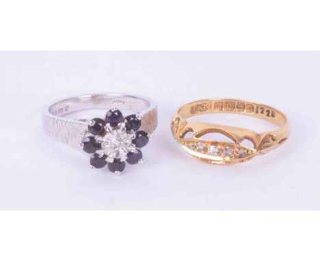 Two 18ct gold rings to include an 18ct white gold flower cluster style ring set sapphires &amp; a diamond, 5.78gm, size K 1/2