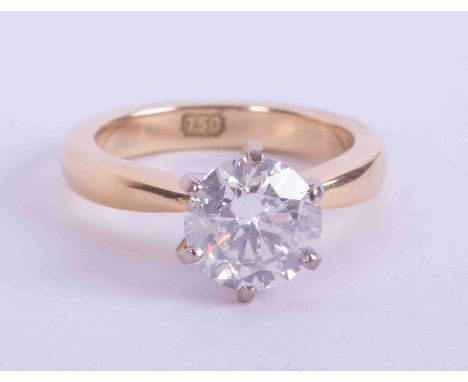An 18ct yellow &amp; white gold six claw solitaire set with approx. 2.00 carats of round brilliant cut diamond, colour G-H an