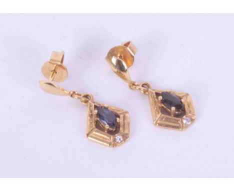 A pair of 9ct yellow gold drop earrings set with a lozenge shaped sapphire and a small round cut diamonds, with post &amp; bu
