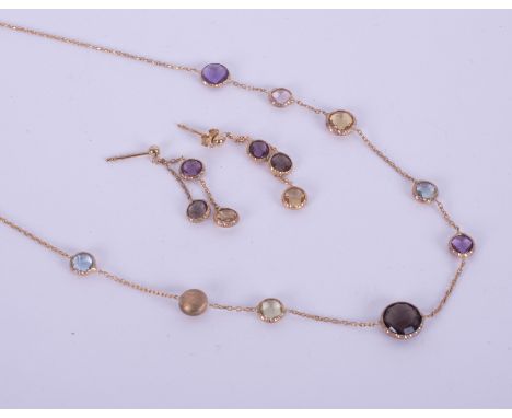 A matching set comprising of a 9ct 18"&nbsp; yellow gold necklace interspaced with round faceted semi-precious gemstones incl