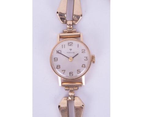 Tissot, a ladies 9ct manual wind wristwatch with 9ct gold bracelet, overall weight 18.8gms. Condition reports are offered as 