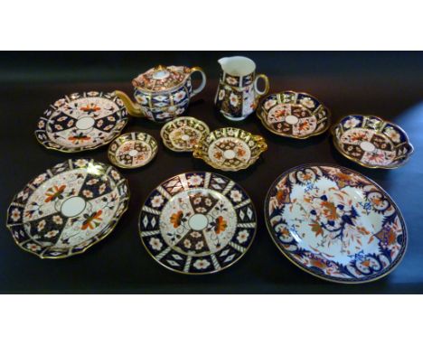 A Royal Crown Derby Porcelain Teapot, decorated in the Imari palette and highlighted with gilt, together with other items of 