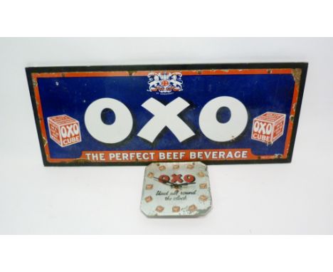 An Early 20th Century Enamel Advertising Sign for Oxo, together with a similar wall clock, 122 x 46cms