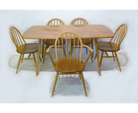 An Ercol Blonde Ash Rectangular Refectory Style Dining Table, together with five matching spindle back chairs