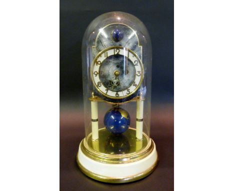 A Kaiser Universe 400 Day Clock, circa 1953, the blue dial with a matching world globe pendulum and with moon phase movement,