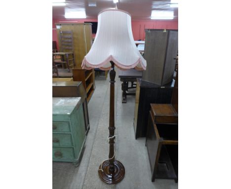 A mahogany standard lamp 