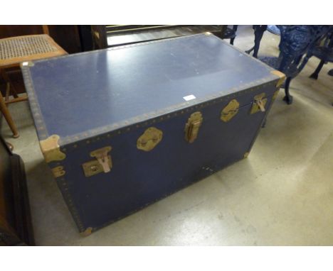 A blue travel trunk 