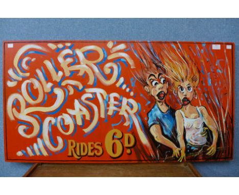 A painted wooden fairground sign, Roller Coaster Rides 