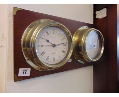 A mounted ships clock/ barometer
