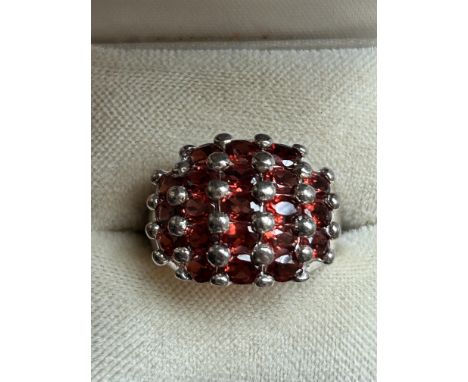 Ladies silver & garnet dress ring 