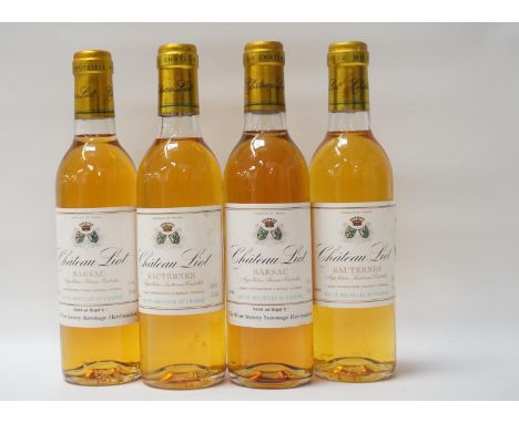 FOUR BOTTLES OF CHATEAU LIOT BARSACTwo vintages of dessert wine selected and shipped by The Wine Society.  Two bottles CHATEA