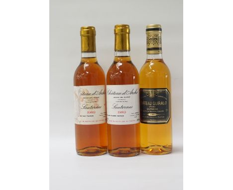 THREE BOTTLES OF VINTAGE SAUTERNESA selection of three bottles of Sauternes, comprising: two bottles of Chateau d'Arche Grand