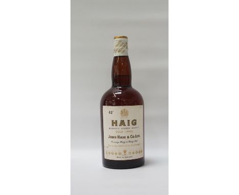 HAIG GOLD LABEL - SPRING CAPA bottle of the famous Haig Gold Label Blended Scotch Whisky from the 1960s with the lovely sprin