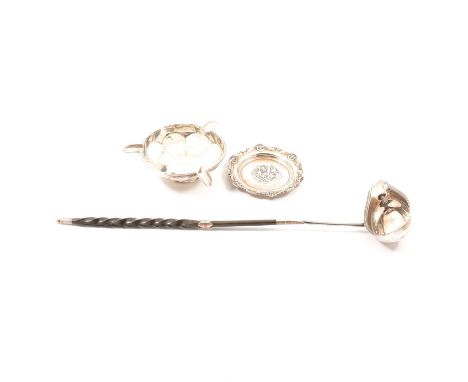 A silver toddy ladle with whalebone handle, London 1791; circular silver ashtray, Birmingham 1912, 2.2oz; a silver pin tray w