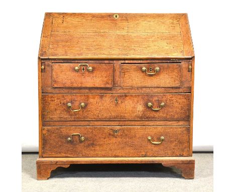 George III oak bureau, fall front with fitted interior, two short and two long graduating drawers, bracket feet, width 93cm, 