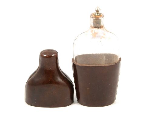 Late 18th/ early 19th century glass hipflask in stitched-leather case, the glass bottle with original cork stopper with silve