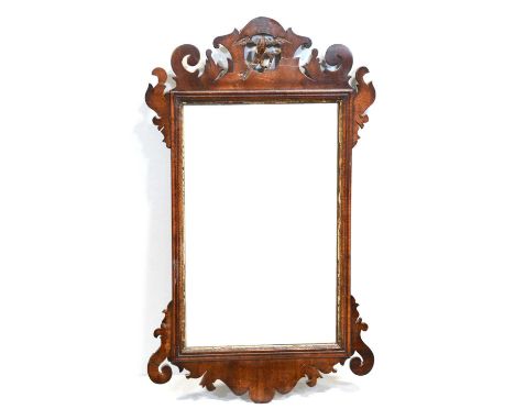 Chippendale style stained mahogany pier glass, rectangular glass, fretted outlines, 77x45cm, damaged.