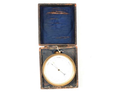 French brass drum cased aneroid barometer, enamelled dial, 12.5cm, outer case defective.