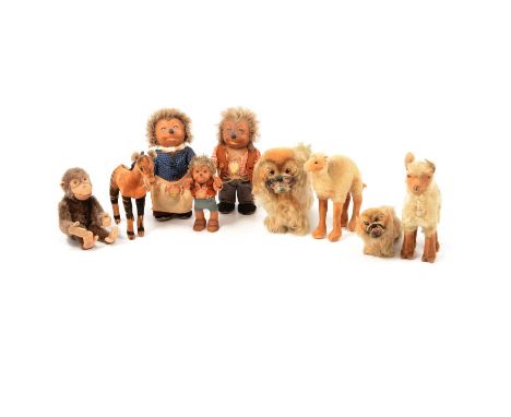 A collection of 1960s Steiff animal toys, including Micki, Mecki, and Macki Steiff Hedgehog family, a llama, camel, Okapi, sm