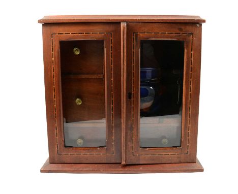 Edwardian mahogany and inlaid smoker's cabinet, the glazed cupboard enclosing two short drawers and a long drawer surrounding