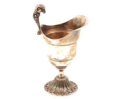 Late 19th century Adam Revival electroplated cream jug, helmet-shaped with a spreading fluted foot and a handle modelled as a