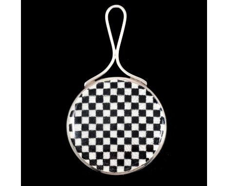 An Art Deco enamelled white metal miniature hand mirror, 37mm black and white chequer board design to back, plain loop handle