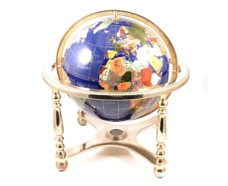 Modern hardstone table globe, brass frame, width 49cm.