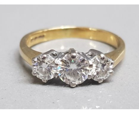 Ladies 18ct yellow gold 3 stone diamond ring, featuring 3 round brilliant cut diamonds set in a white gold claw setting appro