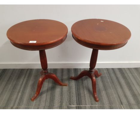 A pair of Georgian style lamp tables.