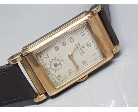 Gents 9ct yellow gold Rolex wristwatch with brown leather straps &amp; rectangular case, cream dial, GP hour markers + hands,