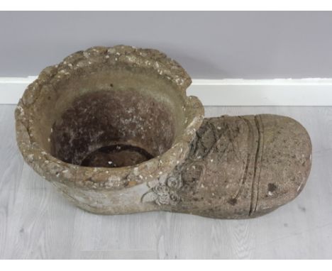 Large stone garden planter in the style of a boot, length 75cm