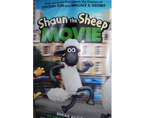 Three large scale cinema poster banners for the 2014 Shaun the Sheep the Movie, featuring Shaun the sheep running, all on str