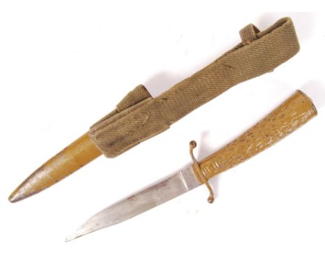 A rare late 19th / early 20th century German hunting dagger, likely of military origin. Metal faux horn grips, with shaped qu