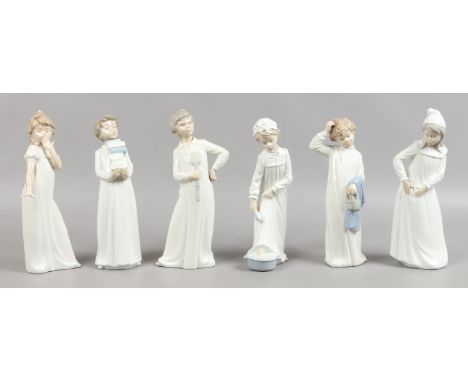 Six Nao figures modelled as children in night clothes.