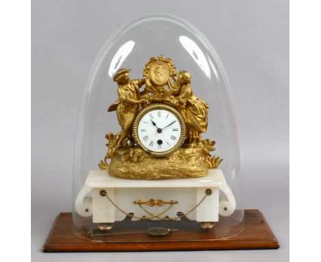 A gilt figural mantel clock raised on marble plinth under glass dome (AF).