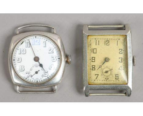 A gentlemans silver wristwatch with wire lugs and enamel dial along with another Art Deco gents watch head.