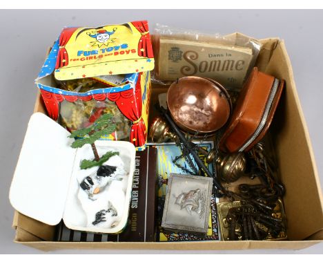 A box of mostly vintage collectables including postcards of The Somme, keys, lead toys by Britains, weighing scales, tin trac