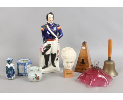 A group of collectables walnut metronome bust Goddess of Health, Russian vase, Cranberry smoke dome and Staffordshire figure 