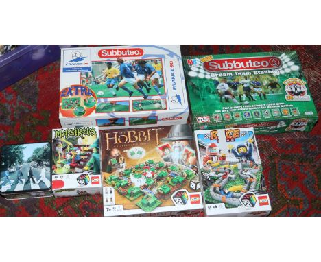 A collection of board games to include Lego, Subbuteo, Beatles jigsaw etc.