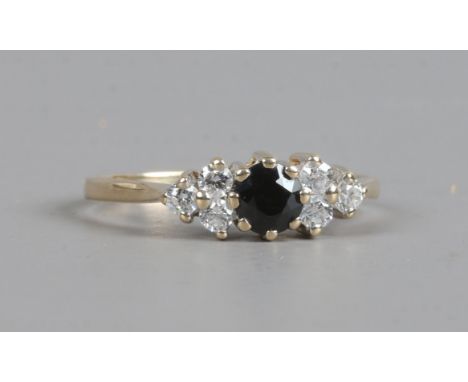 A 9ct gold sapphire and white paste ring, size P.