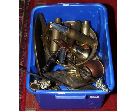 A collection of brass and metalwares to include shell cases, companion fire side set crumb scoop and a miniature Davy lamp st